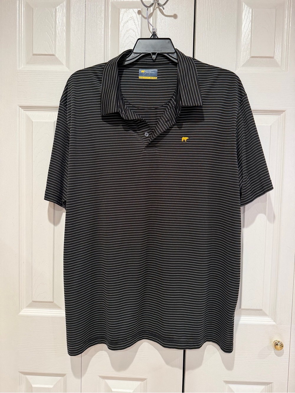 Men's Black Striped Polo with Subtle Yellow Logo